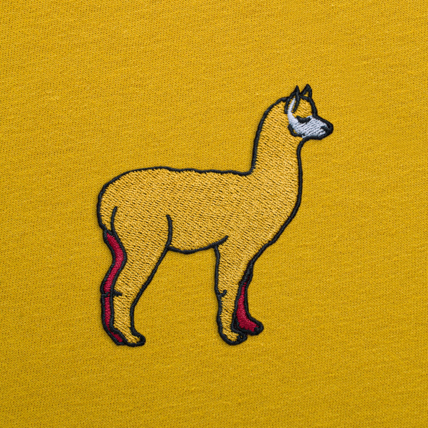 Bobby's Planet Women's Embroidered Alpaca T-Shirt from South American Amazon Animals Collection in Mustard Color#color_mustard