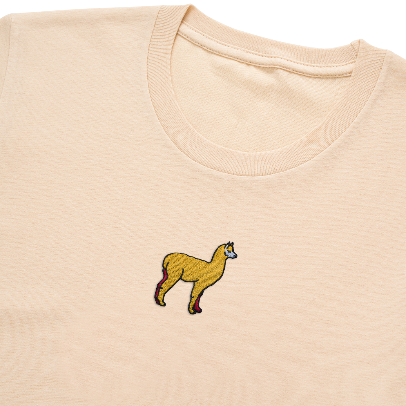 Bobby's Planet Women's Embroidered Alpaca T-Shirt from South American Amazon Animals Collection in Soft Cream Color#color_soft-cream