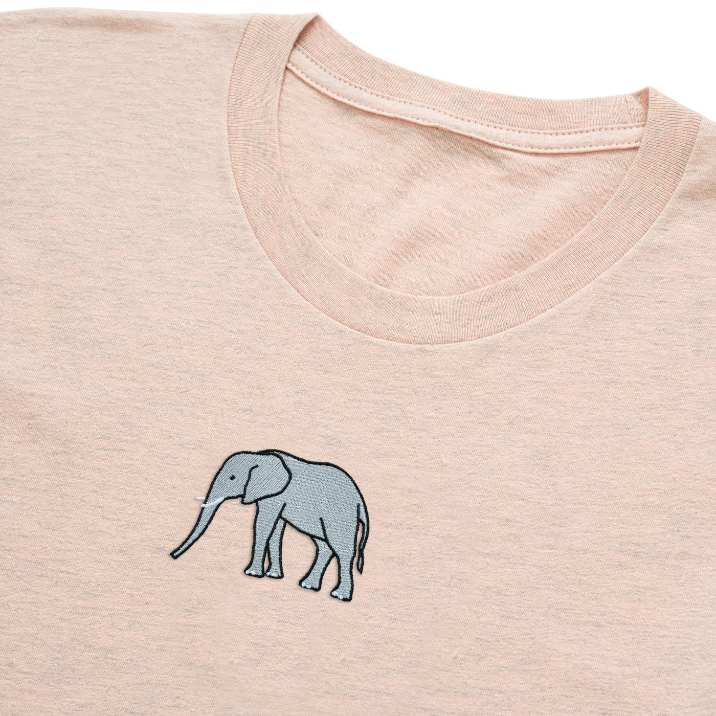 Bobby's Planet Women's Embroidered Elephant T-Shirt from African Animals Collection in Heather Prism Peach Color#color_heather-prism-peach