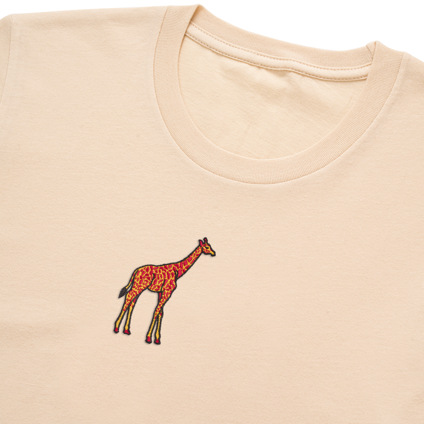 Bobby's Planet Women's Embroidered Giraffe T-Shirt from African Animals Collection in Soft Cream Color#color_soft-cream